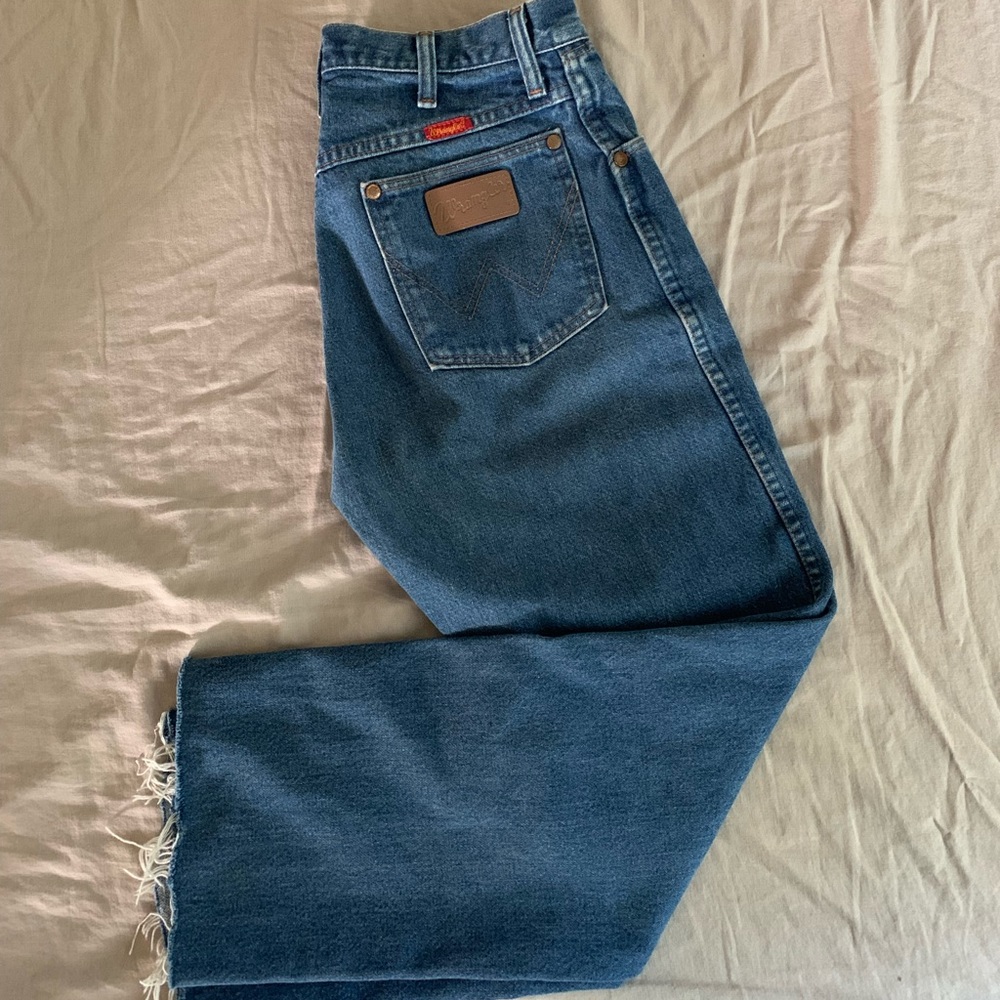 Wrangler jeans. High rise, wide leg with frayed bottom. Heavier denim.